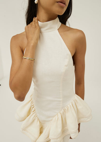 Vestido de lino Rania con peplum lateral | Crema