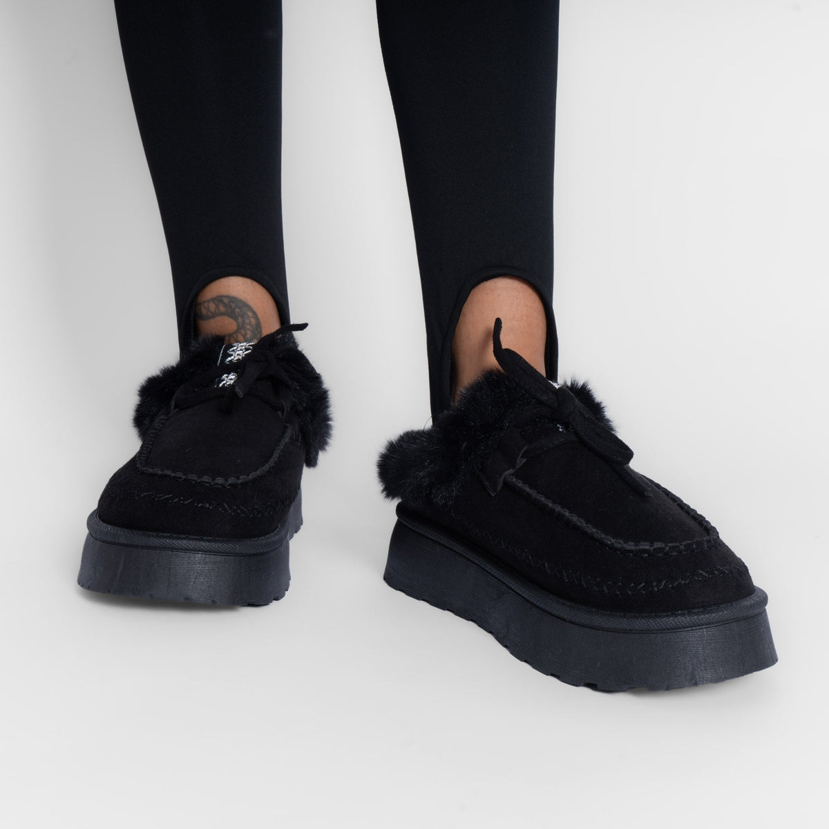 Pantufla tipo mocasín acogedora
