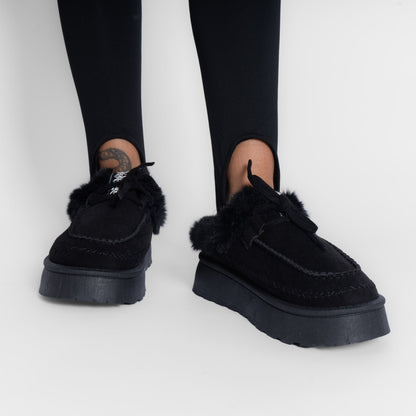 Pantufla tipo mocasín acogedora