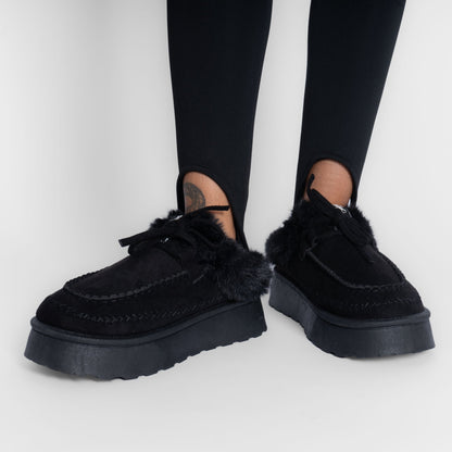 Pantufla tipo mocasín acogedora