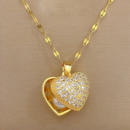 Collar elegante y lujoso de ostra con perla en forma de corazón color melocotón