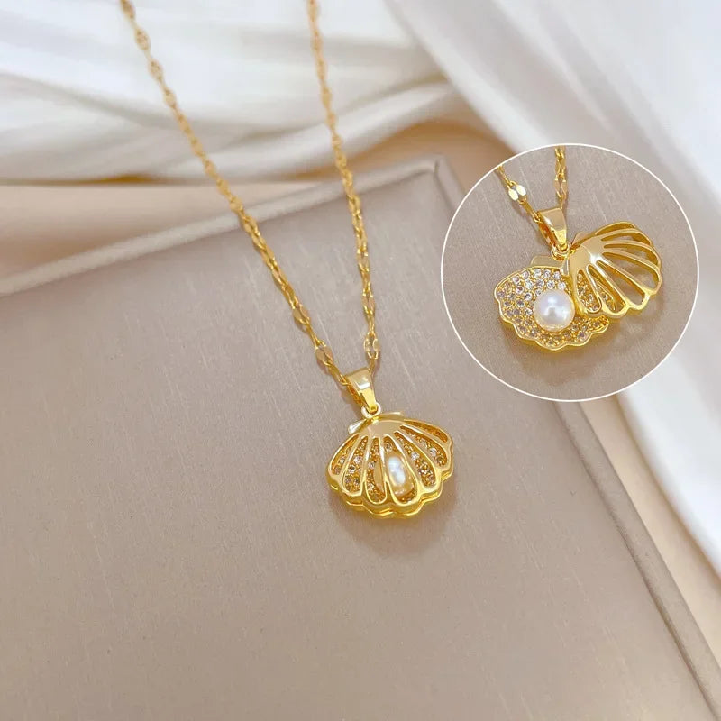 Collar elegante y lujoso de ostra con perla en forma de corazón color melocotón