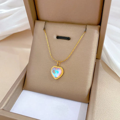 Collar elegante y lujoso de ostra con perla en forma de corazón color melocotón
