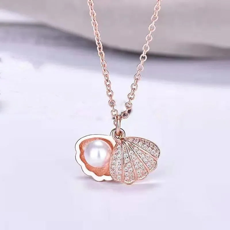 Collar elegante y lujoso de ostra con perla en forma de corazón color melocotón