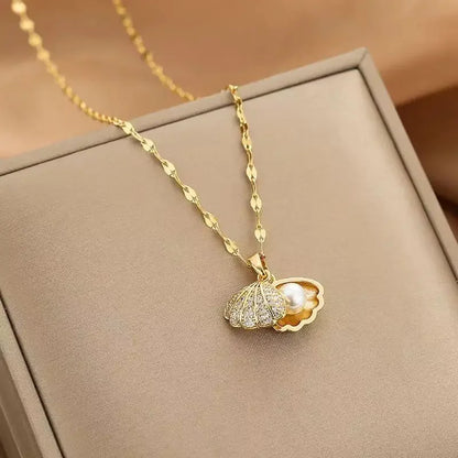 Collar elegante y lujoso de ostra con perla en forma de corazón color melocotón