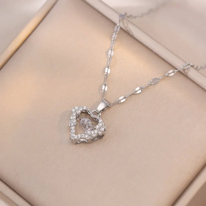 Collar elegante y lujoso de ostra con perla en forma de corazón color melocotón
