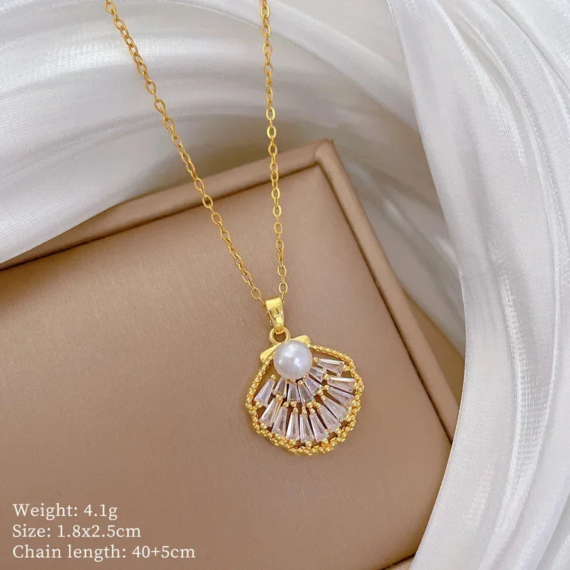 Collar elegante y lujoso de ostra con perla en forma de corazón color melocotón