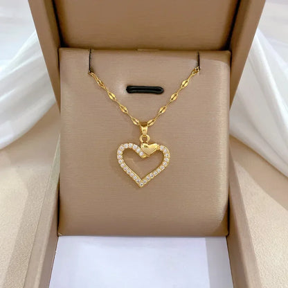 Collar elegante y lujoso de ostra con perla en forma de corazón color melocotón