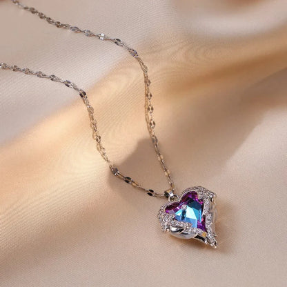 Collar elegante y lujoso de ostra con perla en forma de corazón color melocotón