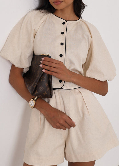 Blusa Ellena de mangas voluminosas en contraste | Almendra/Negro