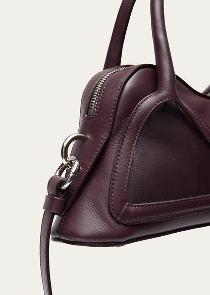 Bolso Hilma Mini de cuero vinílico color burdeos