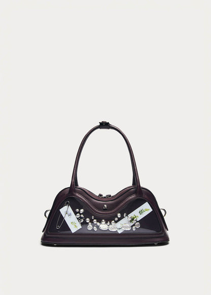 Bolso Hilma de cuero vinílico color burdeos