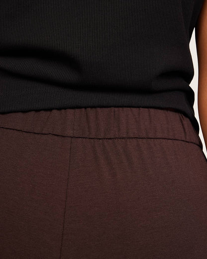 Pantalones de corte relajado - Regular - Algarroba
